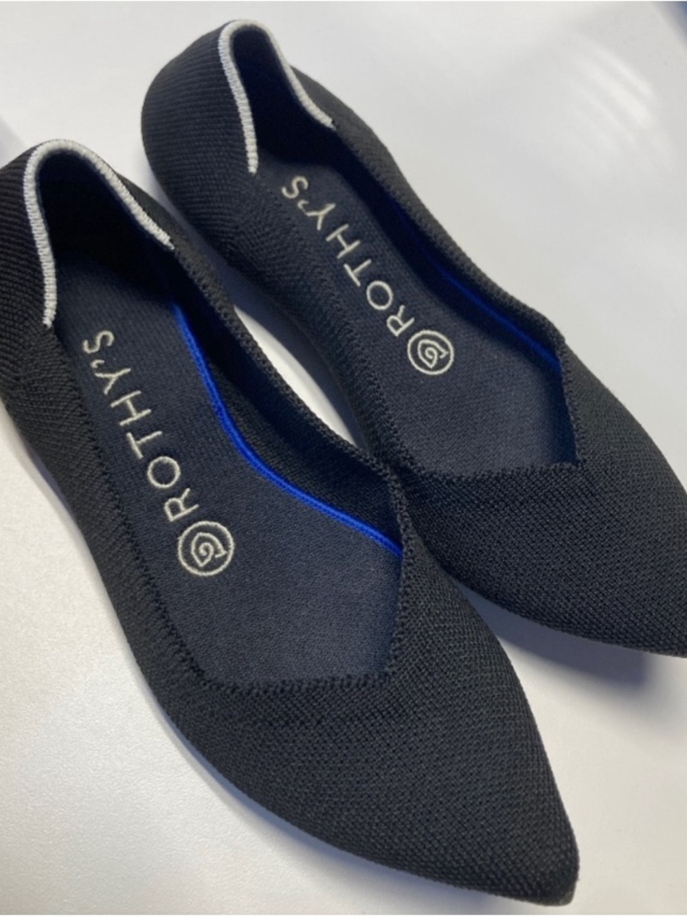 Rothy's Black Pointed Knit Slip-On Flats with White Trim